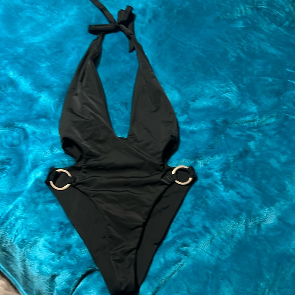 High waisted, open back, low cut little black one piece swimsuit